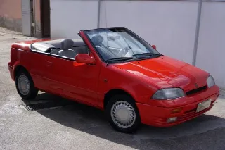 Foto 3 di 10: SUZUKY Swift 1.3i 68 CV cat CABRIO  