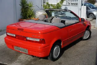 Foto 2 di 10: SUZUKY Swift 1.3i 68 CV cat CABRIO  