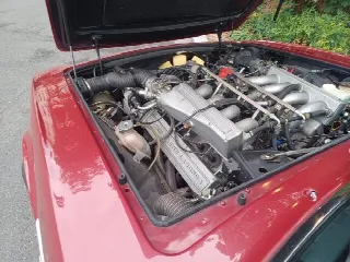 Foto 4 di 4: ASTON MARTIN V8 Volante 