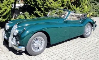 Foto 1 di 5: JAGUAR XK140  DHC