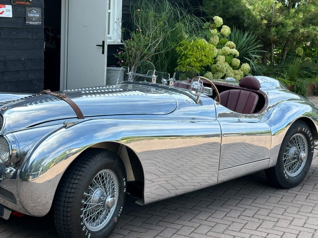 JAGUAR XK 150 150 OTS with special polished aluminum race body. 