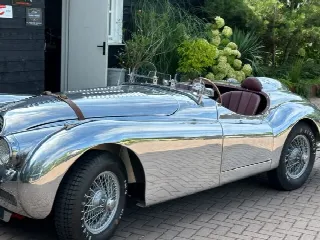 Foto 1 di 8: JAGUAR XK 150 150 OTS with special polished aluminum race body. 