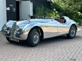 Foto 4 di 8: JAGUAR XK 150 150 OTS with special polished aluminum race body. 