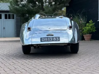 Foto 6 di 8: JAGUAR XK 150 150 OTS with special polished aluminum race body. 