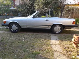 Foto 12 di 12: MERCEDES-BENZ SL(1971-1989) 560   