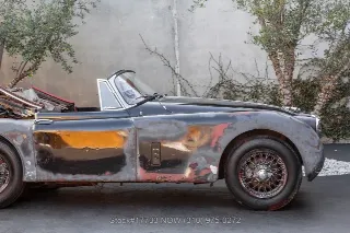 Foto 10 di 24: 1959 Jaguar XK150