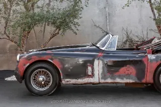 Foto 12 di 24: 1959 Jaguar XK150