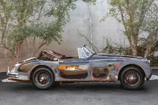 Foto 4 di 24: 1959 Jaguar XK150