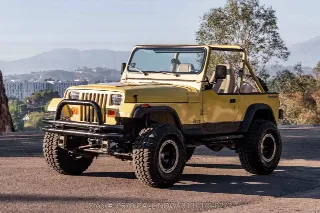 Foto 12 di 24: 1991 Jeep Wrangler 4x4