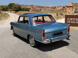 Foto 8 di 8: Peugeot 404 Super Luxe | 1967 | Route 66 Auctions