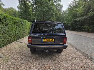 Foto 6 di 8: Jeep Cherokee XJ Limited | 1990 | Route 66 Auctions