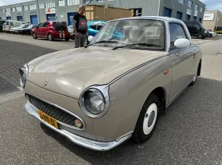 Foto 4 di 8: Nissan Figaro | 1991 | Route 66 Auctions