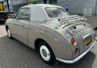 Foto 5 di 8: Nissan Figaro | 1991 | Route 66 Auctions