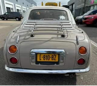 Foto 6 di 8: Nissan Figaro | 1991 | Route 66 Auctions