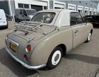 Foto 7 di 8: Nissan Figaro | 1991 | Route 66 Auctions