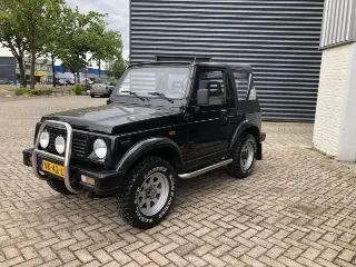 Foto 3 di 8: Suzuki Samurai Rhino | 1991 | Route 66 Auctions