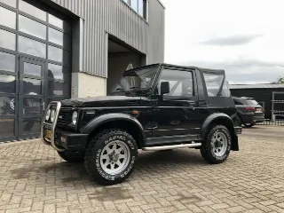 Foto 4 di 8: Suzuki Samurai Rhino | 1991 | Route 66 Auctions
