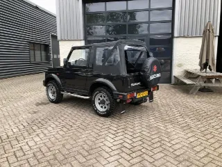 Foto 6 di 8: Suzuki Samurai Rhino | 1991 | Route 66 Auctions