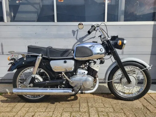 Suzuki T10 | 1964 | Route 66 Auctions