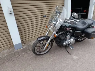 Foto 2 di 8: Harley-Davidson XL 1200 T SuperLow | 2014 | Route 66 Auctions
