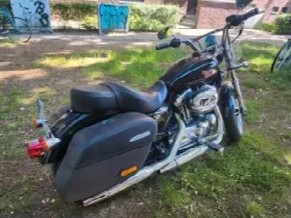 Foto 6 di 8: Harley-Davidson XL 1200 T SuperLow | 2014 | Route 66 Auctions