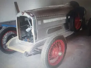 Foto 1 di 9: REO (1905-1975) 6C race car 