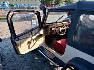 Foto 4 di 4: JEEP Wrangler Sahara Softtop K6 