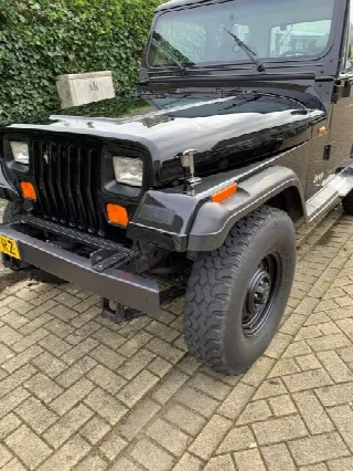 Foto 2 di 7: JEEP Wrangler 2.5i 